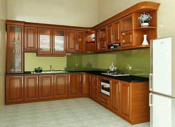 مطبخ على شكل L بخشب داكن
